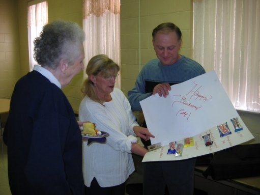 Patty receiving her giant birthday card