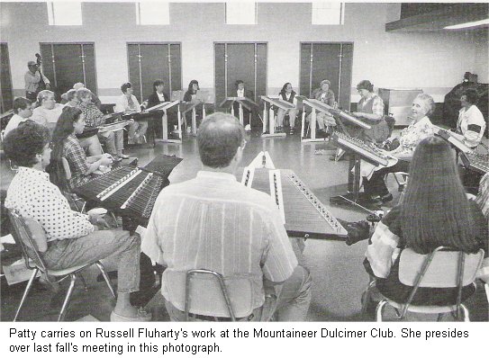 Patty carries on Russell Fluharty's work at the Mountaineer Dulcimer Club. She presides over last fall's meeting in this photograph.